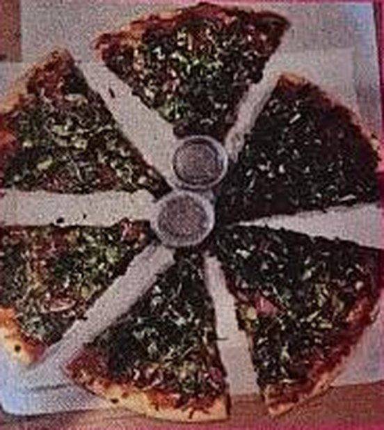 Vegetable pizza sliced and ready
